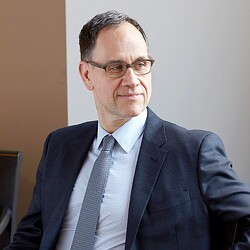 A man smiling for the camera.